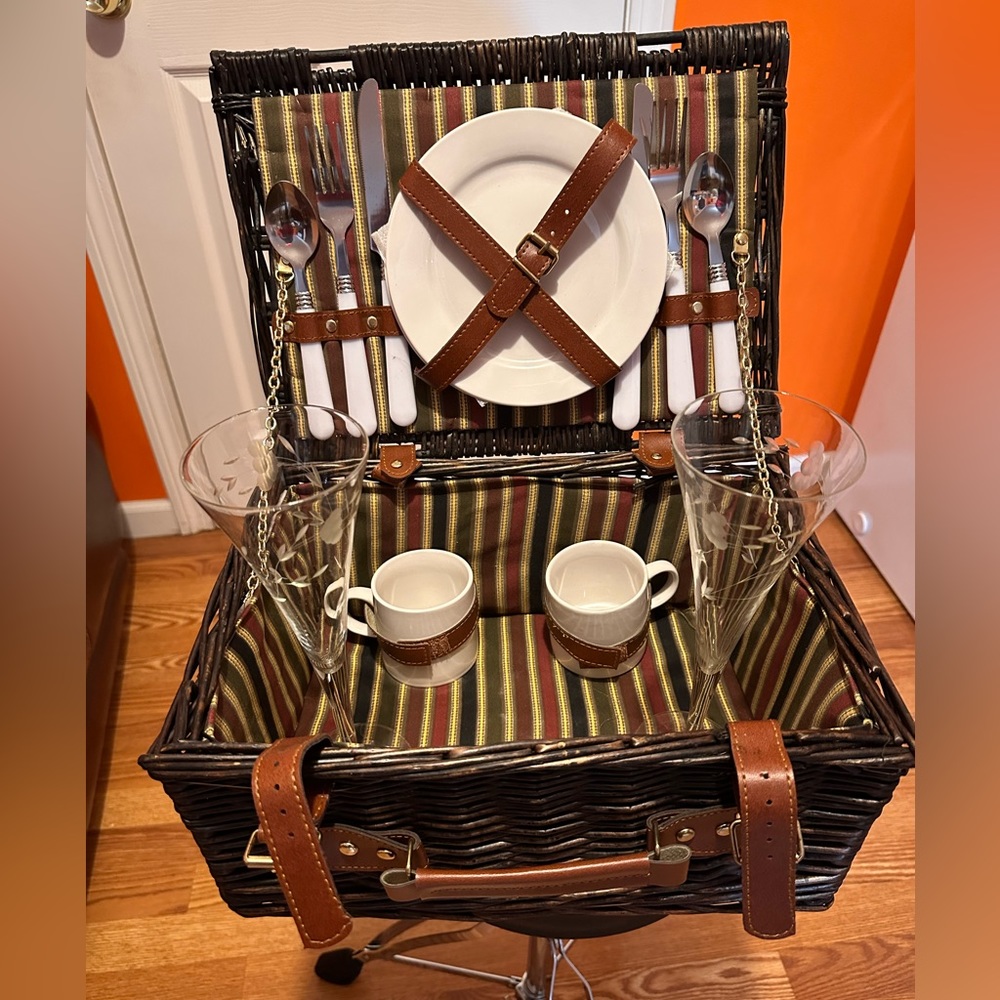 Brown wicker portable dining set. Never been used and ready to go.